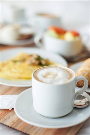 Cappuccino and breakfast on tray Stock Photo - Premium Royalty-Free, Code: 632-09021560