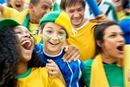 screaming boy curly hair - Brazilian football fans watching football match Stock Photo - Premium Royalty-Free, Code: 632-09130118