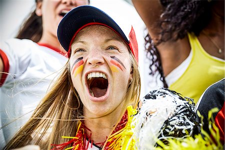 simsearch:632-09130119,k - German football fan cheering at match Photographie de stock - Premium Libres de Droits, Code: 632-09130136