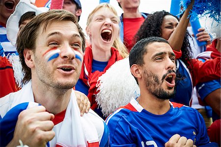 French football fans watching football match Stock Photo - Premium Royalty-Free, Code: 632-09130150