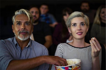 Couple watching movie together Stock Photo - Premium Royalty-Free, Code: 632-09140260