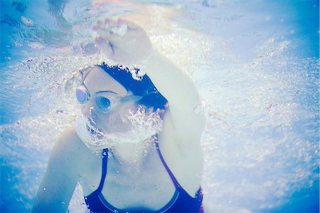 simsearch:6128-08728124,k - Woman swimming underwater Stock Photo - Premium Royalty-Free, Code: 632-09140309