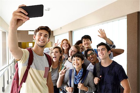 simsearch:632-09158044,k - Students posing for group selfie Stock Photo - Premium Royalty-Free, Code: 632-09158017