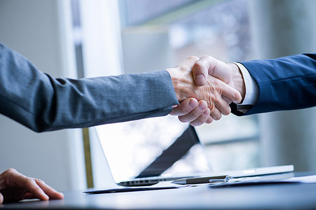 simsearch:632-05553538,k - Business people shaking hands Stock Photo - Premium Royalty-Free, Code: 632-09192115