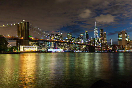 Manhattan skyline and Brooklyn Bridge at dusk Stock Photo - Premium Royalty-Free, Code: 632-09273118