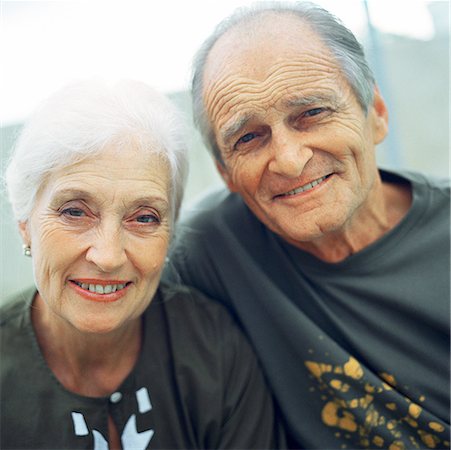 elderly face - Mature couple close together, smiling at camera Stock Photo - Premium Royalty-Free, Code: 632-01144321