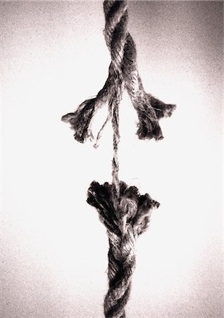 Frayed rope about to break Foto de stock - Sin royalties Premium, Código: 632-01144895