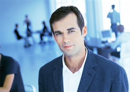 Businessman in office, portrait Stock Photo - Premium Royalty-Free, Code: 632-01146045