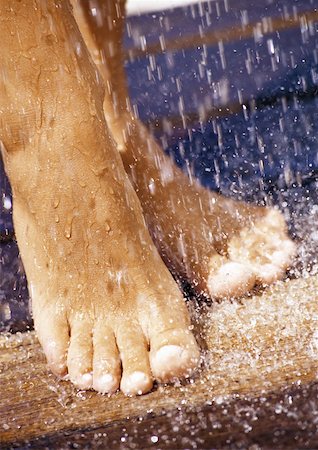 simsearch:632-01146602,k - Feet under shower, close-up Stock Photo - Premium Royalty-Free, Code: 632-01146623