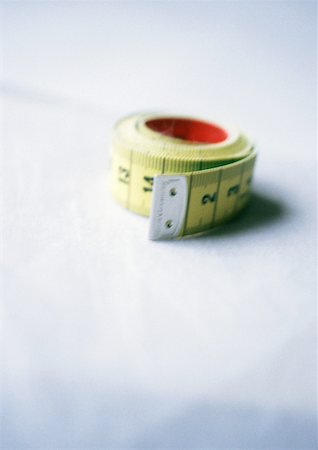 Measuring tape, close-up, blurred Stock Photo - Premium Royalty-Free, Code: 632-01147148