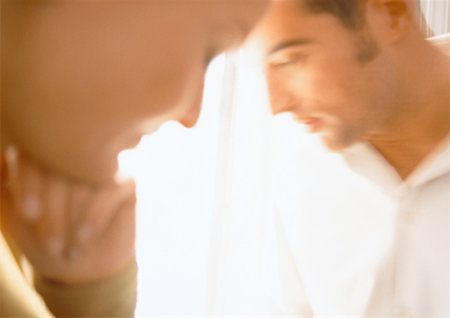Man looking away from woman, blurred close up. Stock Photo - Premium Royalty-Free, Code: 632-01147770
