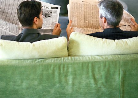 simsearch:632-01148045,k - Businessmen sitting side by side with newspapers, rear view Stock Photo - Premium Royalty-Free, Code: 632-01148086