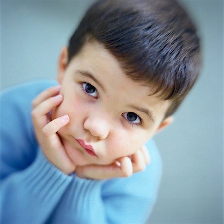simsearch:632-05401219,k - Little boy pouting, portrait Fotografie stock - Premium Royalty-Free, Codice: 632-01149407