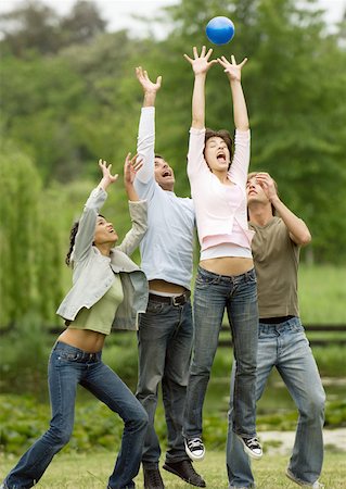 Young people jumping for ball Stock Photo - Premium Royalty-Free, Code: 632-01154553