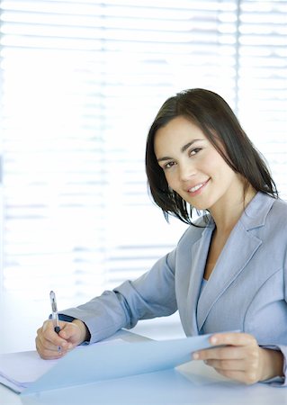 simsearch:632-01155400,k - Businesswoman smiling at camera, portrait Stock Photo - Premium Royalty-Free, Code: 632-01155349