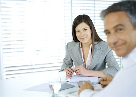 simsearch:632-01155400,k - Business colleagues smiling at camera Stock Photo - Premium Royalty-Free, Code: 632-01155359
