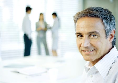 Businessman smiling, portrait Stock Photo - Premium Royalty-Free, Code: 632-01155368