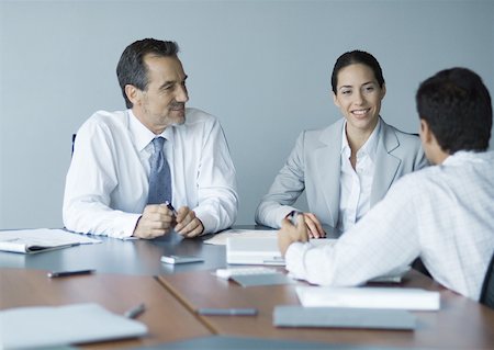 executives on table back - Business meeting Stock Photo - Premium Royalty-Free, Code: 632-01155395