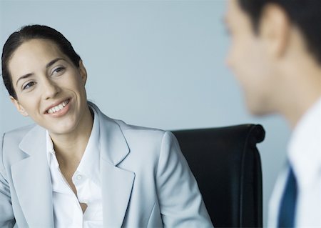 simsearch:632-01155400,k - Business colleagues working together, smiling Stock Photo - Premium Royalty-Free, Code: 632-01155400