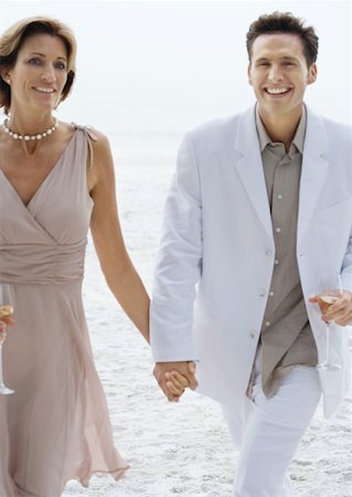 Couple in formalwear on beach Stock Photo - Premium Royalty-Free, Code: 632-01156015