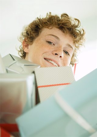 simsearch:632-01156362,k - Boy with pile of presents Stock Photo - Premium Royalty-Free, Code: 632-01156364