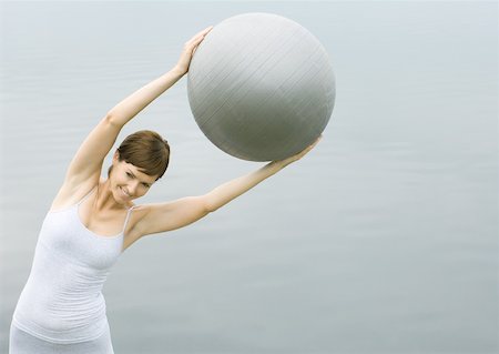 simsearch:695-03373919,k - Woman working out with fitness ball Stock Photo - Premium Royalty-Free, Code: 632-01156451