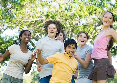 simsearch:632-02745223,k - Preteen friends jumping, portrait Stock Photo - Premium Royalty-Free, Code: 632-01156644