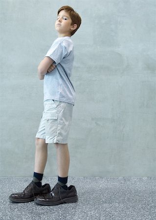 Boy wearing men's shoes Stock Photo - Premium Royalty-Free, Code: 632-01156901