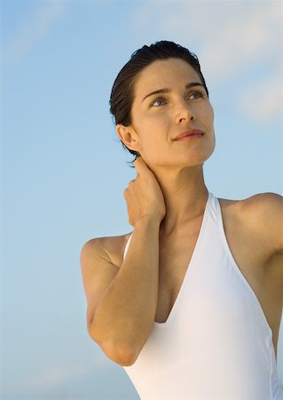 Woman in swimsuit, looking away Stock Photo - Premium Royalty-Free, Code: 632-01157218