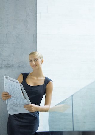 simsearch:632-01148045,k - Businesswoman with newspaper Stock Photo - Premium Royalty-Free, Code: 632-01157411