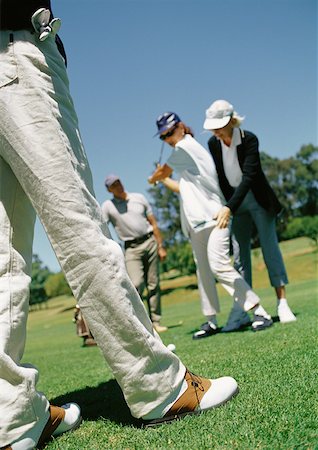simsearch:832-03640492,k - Mature golf players Fotografie stock - Premium Royalty-Free, Codice: 632-01158564