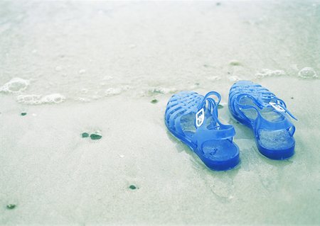 summer beach break - Jelly shoes on beach Stock Photo - Premium Royalty-Free, Code: 632-01158838