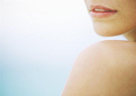 simsearch:695-03388489,k - Woman's shoulder and lower face, close-up Stock Photo - Premium Royalty-Free, Code: 632-01152155