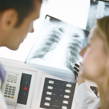 simsearch:632-03629886,k - Doctors in x-ray lab Stock Photo - Premium Royalty-Free, Code: 632-01152772