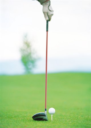 simsearch:632-01153250,k - Golfer holding club next to teed ball Stock Photo - Premium Royalty-Free, Code: 632-01153238