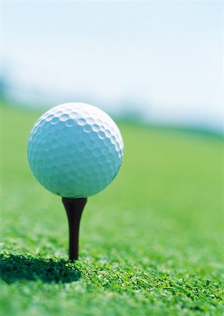 Golf ball on tee, close-up Stock Photo - Premium Royalty-Free, Code: 632-01153241