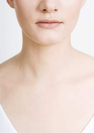 soft skin female - Woman's lower face, neck and chest, close-up Stock Photo - Premium Royalty-Free, Code: 632-01153534