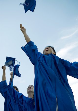 Graduates throwing caps Stock Photo - Premium Royalty-Free, Code: 632-01161695