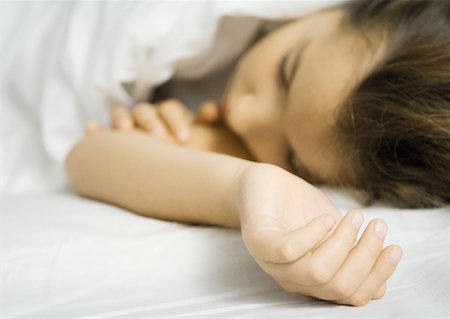 eiderdown duvet white - Child lying in bed Stock Photo - Premium Royalty-Free, Code: 632-01193864