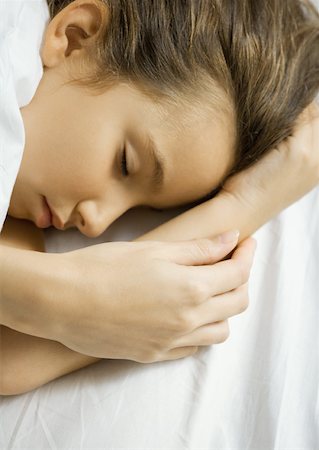 simsearch:695-05764394,k - Girl sleeping, mother's hand on arm Stock Photo - Premium Royalty-Free, Code: 632-01193881