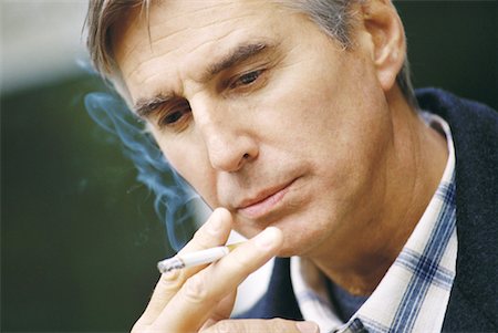 depending - Senior man smoking Stock Photo - Premium Royalty-Free, Code: 632-01234463