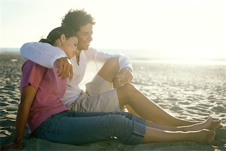 rolled up pants - Teenage couple sitting on beach together Stock Photo - Premium Royalty-Free, Code: 632-01234609