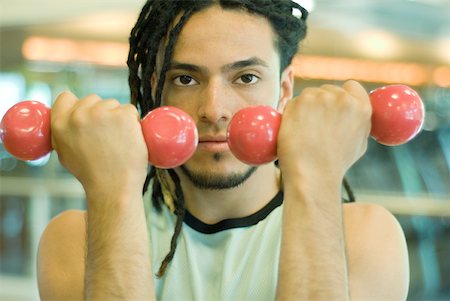 simsearch:695-03375202,k - Man holding up dumbbells Stock Photo - Premium Royalty-Free, Code: 632-01277701