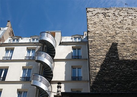 stairs closeup - Apartment buildings with spiral staircase on outside Stock Photo - Premium Royalty-Free, Code: 632-01278105