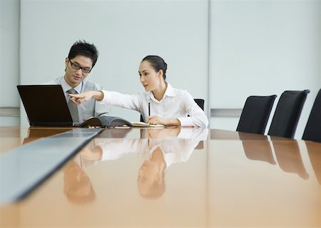 simsearch:632-01271843,k - Two business executives working with laptop in conference room Stock Photo - Premium Royalty-Free, Code: 632-01270390