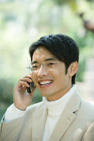 simsearch:632-02745019,k - Man using cell phone, smiling Stock Photo - Premium Royalty-Free, Code: 632-01270517