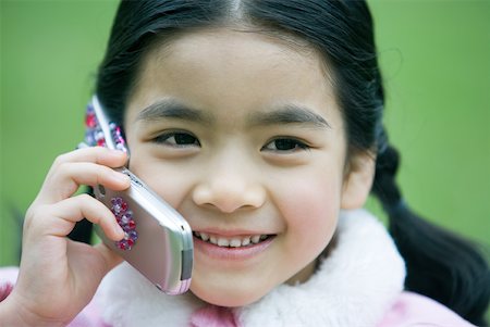 simsearch:632-01271089,k - Girl using cell phone, close-up Stock Photo - Premium Royalty-Free, Code: 632-01270526