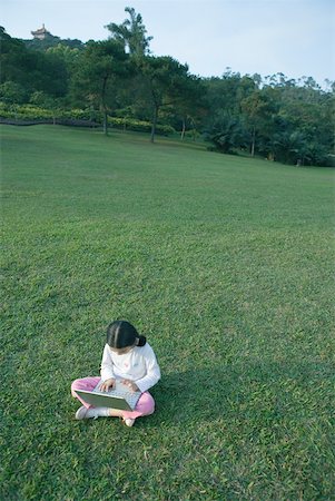 simsearch:632-01271089,k - Girl sitting in grass using laptop Stock Photo - Premium Royalty-Free, Code: 632-01271078