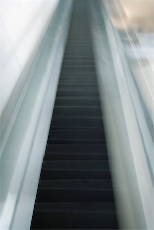 simsearch:632-03847867,k - Escalator, blurred, low angle view Stock Photo - Premium Royalty-Free, Code: 632-01271429
