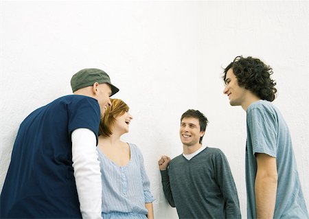 simsearch:632-01271015,k - Group of young adult friends standing in group, laughing Foto de stock - Sin royalties Premium, Código: 632-01271668